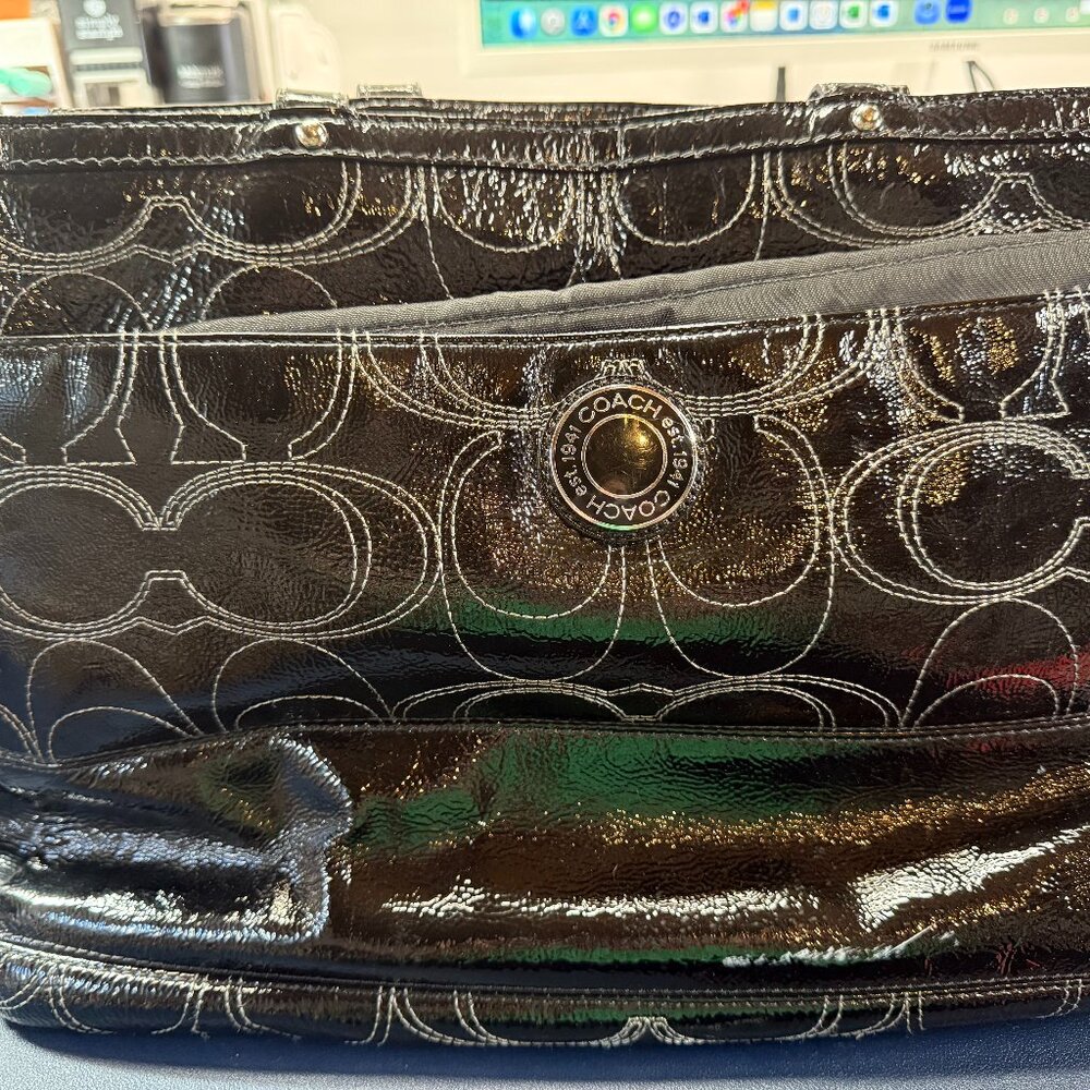 Coach black patent leather diaper bag.